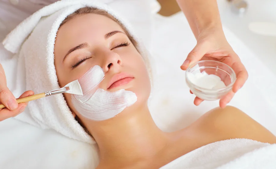 Therapist performing a facial massage at Salima Massage in Patong, Phuket
