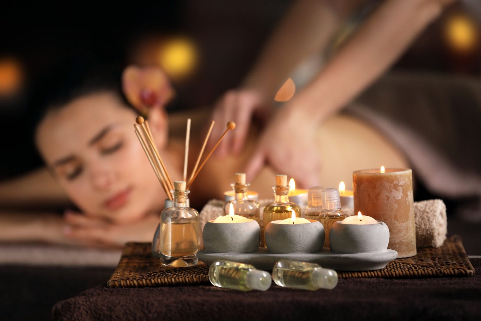 Therapist performing aromatherapy oil massage in Phuket