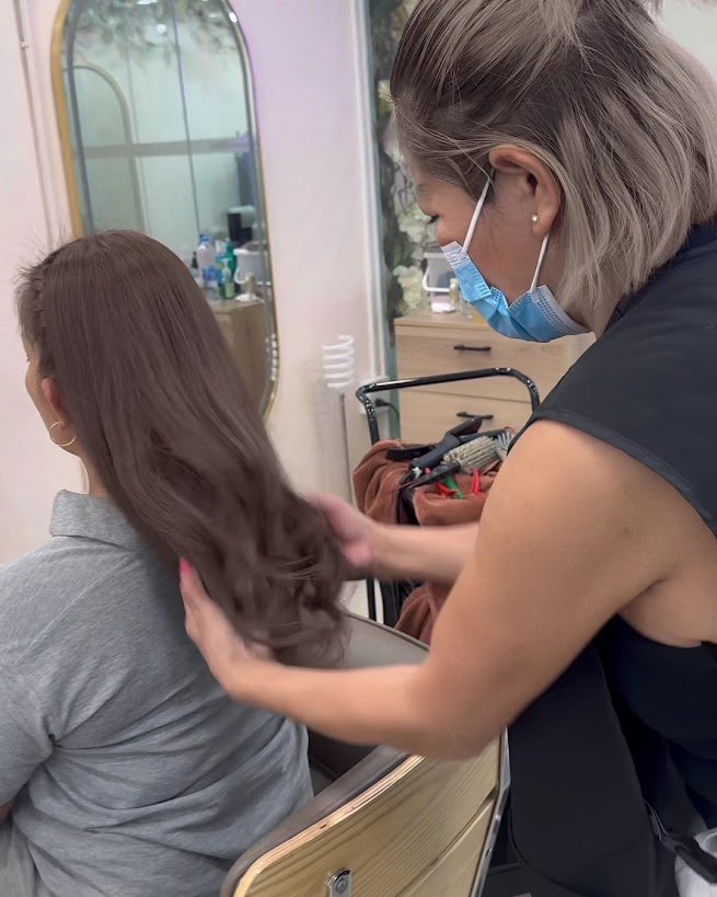 Hair treatment session at Salima, the best hair salon in Patong, with deep conditioning applied to restore moisture and shine